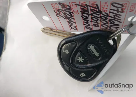 2000 Toyota Tacoma из США, поврежденный, VIN 4TAVL52N2YZ661258